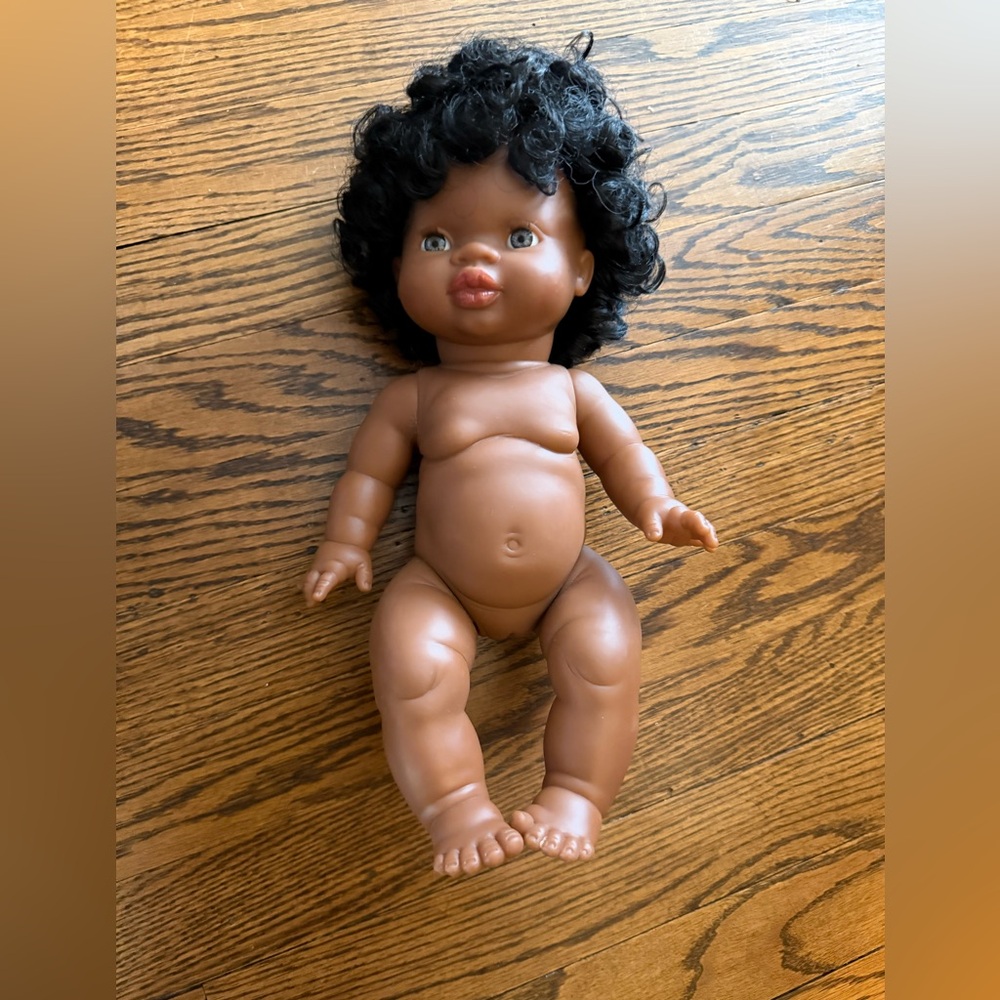 Charming Curly-Haired Baby Doll